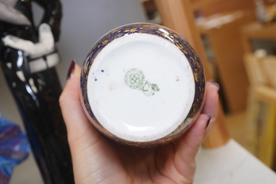 A pair of Royal Doulton vases decorated with irises and a gilt background, 19cm high, and two Art Deco pottery figurines, one marked foreign, tallest 32cm. Condition - fair to good.